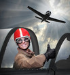 Young pilot in the cockpit.