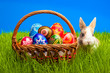 Photo: Easter egg and bunny in basket Easter egg and bunny in basket