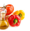 pepper and a bottle with olive oil on the background of the watt
