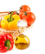 pepper and a bottle with olive oil on the background of the watt
