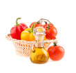 bottle with olive oil on the background of the wattled dish with