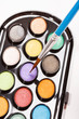 paints with brush