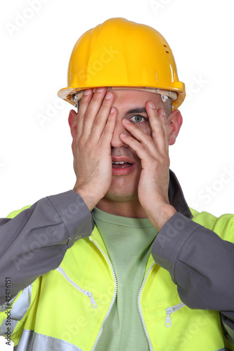 Photo: Tradesman afraid to look Tradesman afraid to look