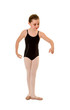 Young Ballet Dancer Practices Positions