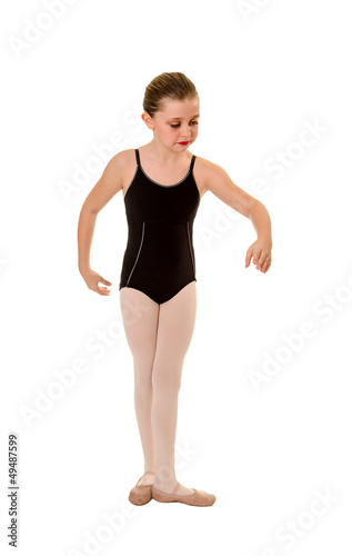 Photo: Young Ballet Dancer Practices Positions Young Ballet Dancer Practices Positions
