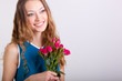 woman holding bouquet of roses