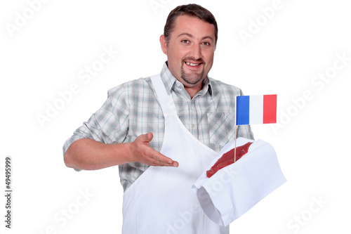 Photo: Butcher proud of his French steak Butcher proud of his French steak