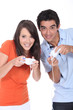 Young couple playing a video game