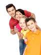 Happy family with children standing together in line