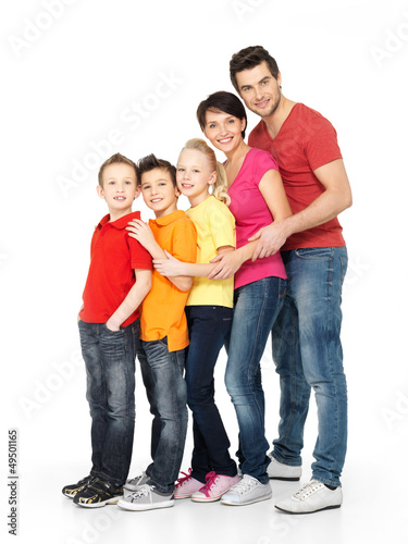 Photo: Happy family with three children standing together Happy family with three children standing together