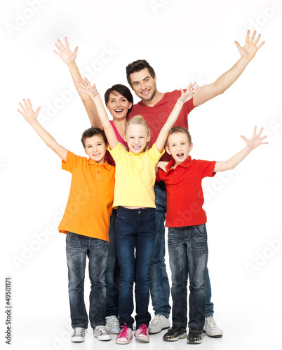 Photo: Happy family with raised hands up Happy family with raised hands up