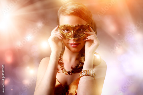 Photo: Beautiful girl in carnival mask Beautiful girl in carnival mask
