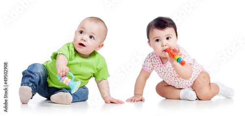 Photo: babies playing isolated babies playing isolated