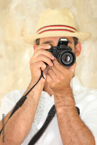 Photo: man taking pictures man taking pictures