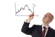 businessman drawing graph