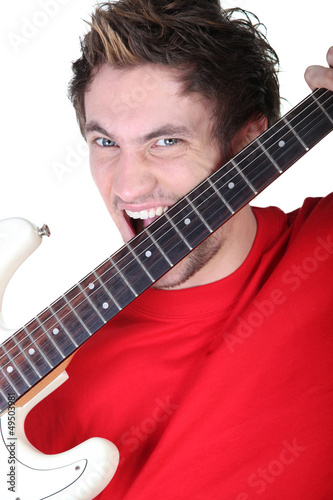 Photo: Screaming man with guitar in hands Screaming man with guitar in hands