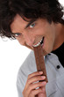 Photo: Man eating chocolate Man eating chocolate