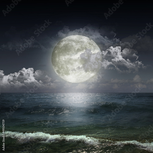Photo: ght cloudy sky with moon ght cloudy sky with moon