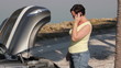 A woman having car trouble talking on her cellphone 2