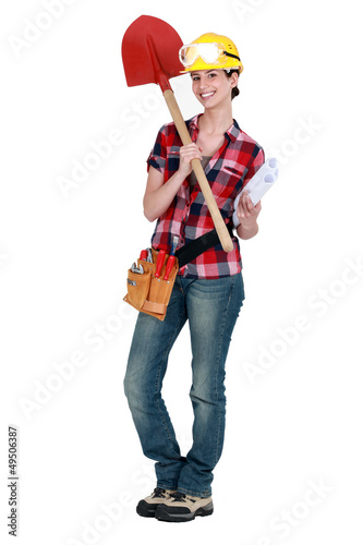 Photo: Female architect with shovel Female architect with shovel