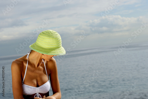 Photo: Woman in white bikini Woman in white bikini