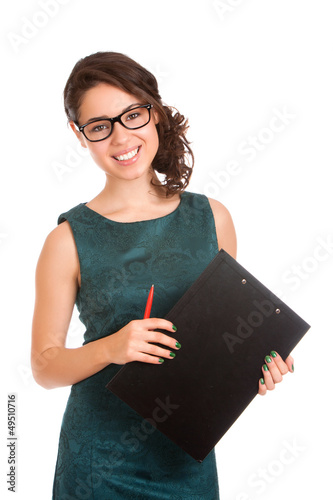 Photo: Young woman holding clipboard Young woman holding clipboard