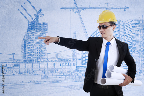 Photo: Architect pointing on something Architect pointing on something