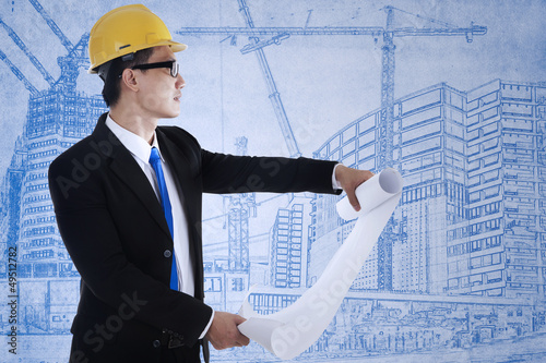 Photo: Architect review blueprint plan Architect review blueprint plan