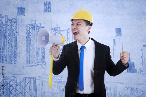 Photo: Business contractor using speaker Business contractor using speaker