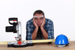 Photo: A fed-up and bored tradesman A fed-up and bored tradesman