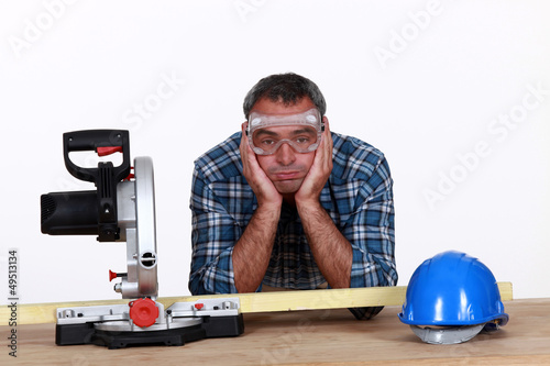 Photo: A fed-up and bored tradesman A fed-up and bored tradesman