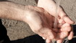 Washing hands and drinking street water, stedi cam, close up