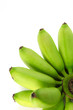 green bananas on white background
