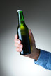 Hand Holding Beer Bottle