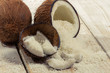 Coconut and the shell on white old table
