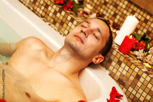 Photo: Young man in spa Young man in spa
