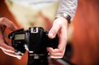 Professional Camera in Hands