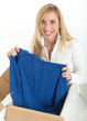 Happy woman with online clothes purchase