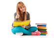 Young girl with books. Isolated on white background