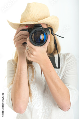 Photo: Female photographer with hat Female photographer with hat