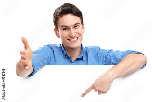 Photo: Man pointing at blank copy space Man pointing at blank copy space
