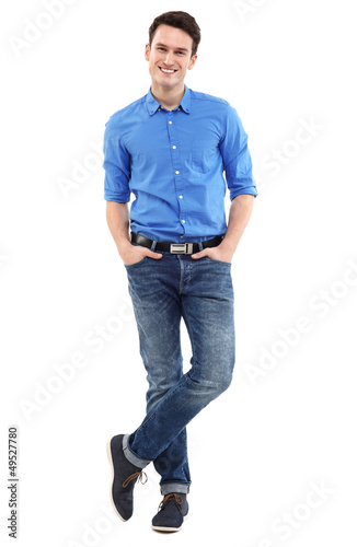 Photo: Man standing with hands in pockets Man standing with hands in pockets