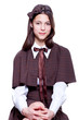 school girl wearing old style formal clothes - isolated