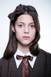 young school girl wearing old vintage style formal clothes