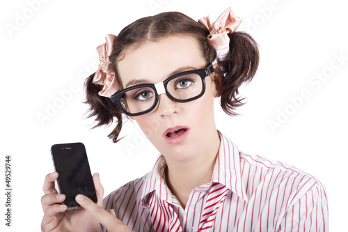 Photo: Smart Woman Accessing Mobile Phone Apps Smart Woman Accessing Mobile Phone Apps