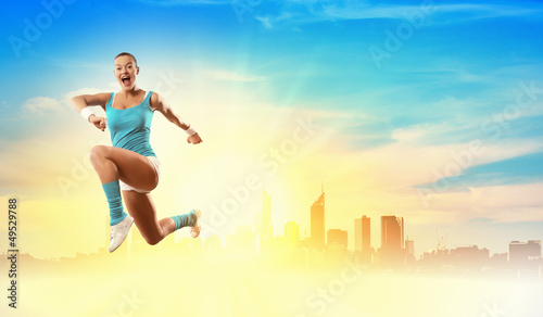 Photo: Image of sport woman jumping Image of sport woman jumping
