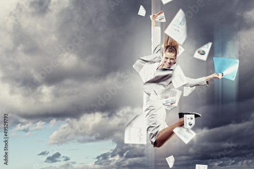 Photo: Image of jumping businesswoman Image of jumping businesswoman