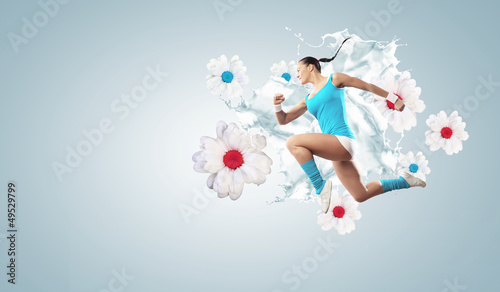 Photo: Image of sport woman jumping Image of sport woman jumping