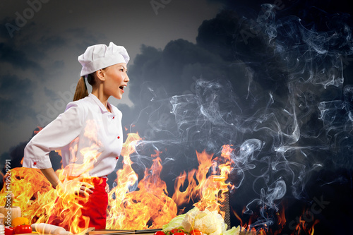 Photo: Asian female cook in anger Asian female cook in anger