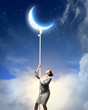 Image of businesswoman climbing the rope
